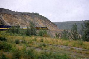 As we motor on down the tracks in a light rain.